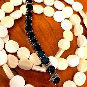 Black Thai spinel tennis bracelet platinum over sterling silver